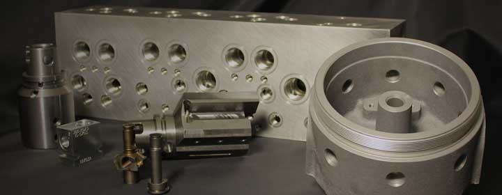 collage of parts machined by IMI