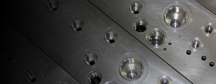 drilled holes - International Machining Inc.